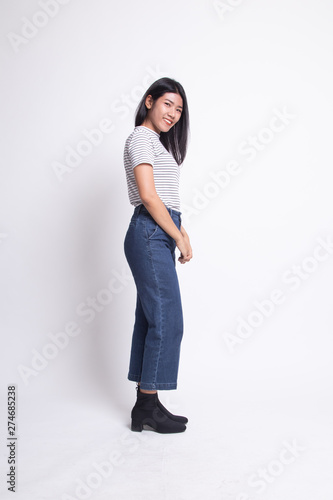Full body side view of beautiful young asian woman.