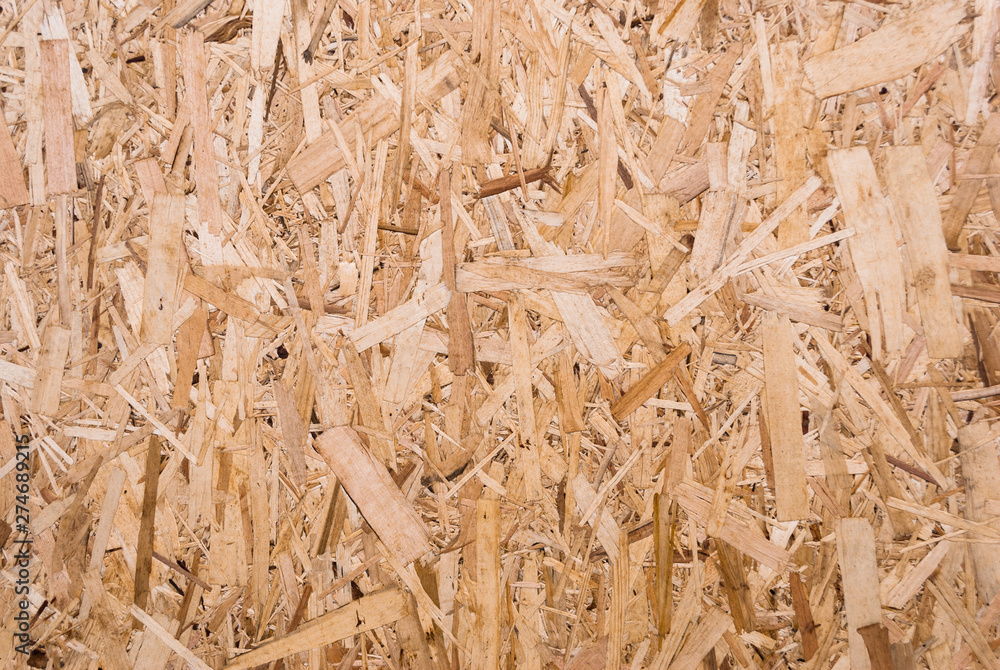 Plywood board texture. Compressed sawdust panel background. Wood surface for interior design and decoration. Plywood board texture. Compressed sawdust panel background. Wood surface for interior design and decoration.