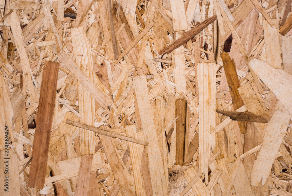 Plywood board texture. Compressed sawdust panel background. Wood surface for interior design and decoration. Plywood board texture. Compressed sawdust panel background. Wood surface for interior design and decoration.