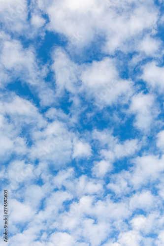 white soft clouds in blue sky