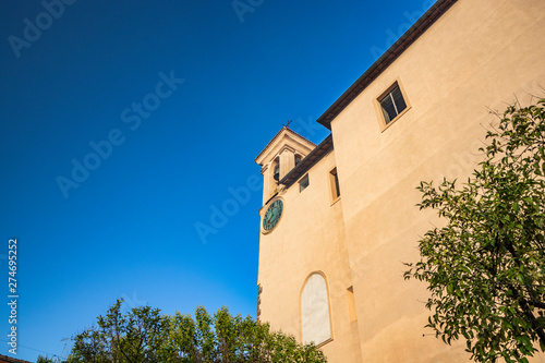 The Convent of S. Maria delle Grazie, in Santa Maria square. The bell tower with the clock. The blue sky at sunset. Zagarolo, Province of Rome, Lazio, Italy