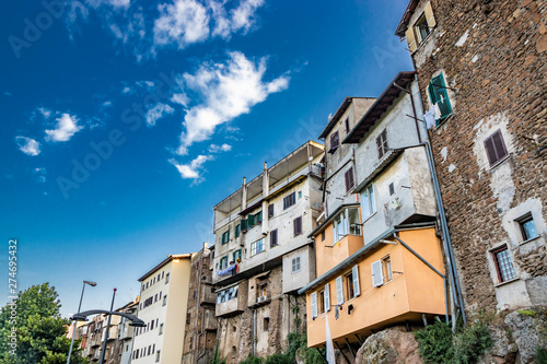 Canvas Print A view of the city of Zagarolo, with the houses built on the rock, overlooking a tuff hill