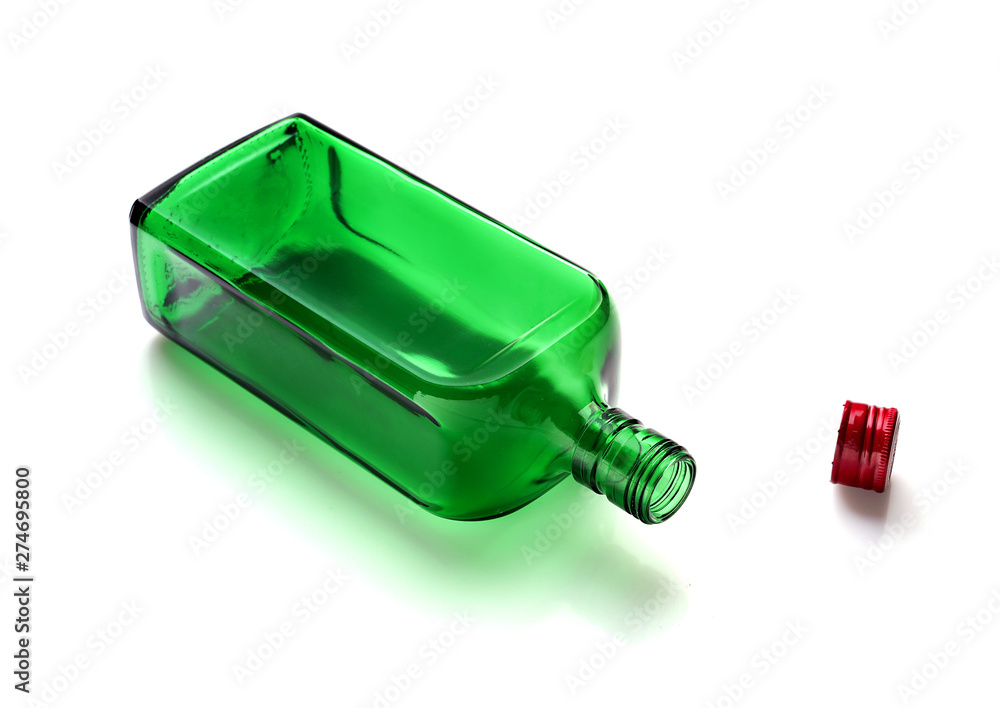 Empty glass bottle for drinks on a white background. Empty glass bottle for drinks on a white background.