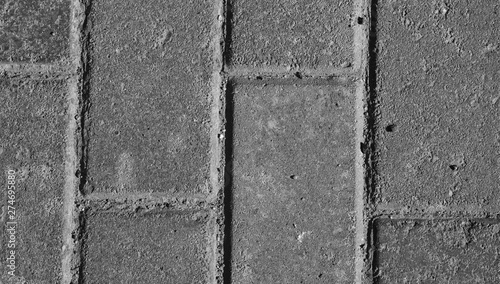 Paving slabs in gray tones concrete background