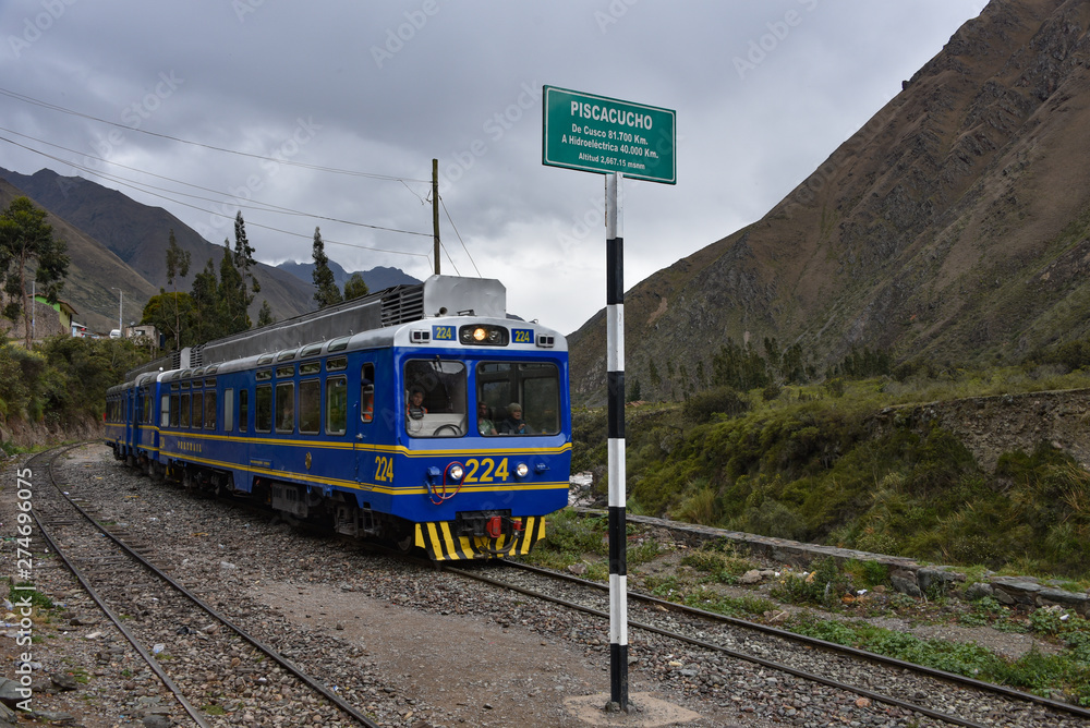 Cusco, Peru - Oct 15, 2019: A Peru Rail Expedition train travelling from Ollantaytambo to Machu Picchu