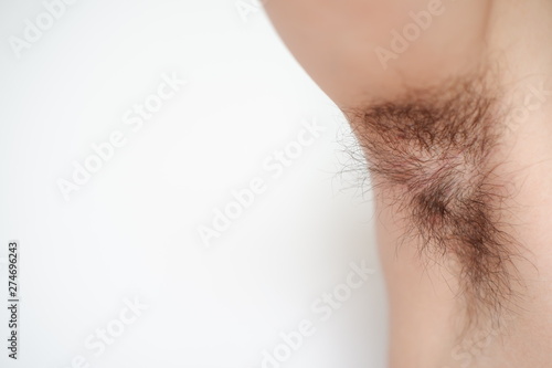 Close up armpit with long hair isolated background