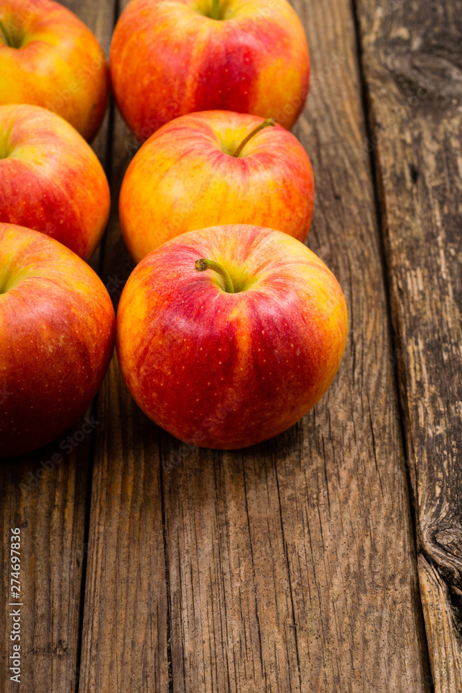 apple fruits in a row, old weathered wood table background apple fruits in a row, old weathered wood table background