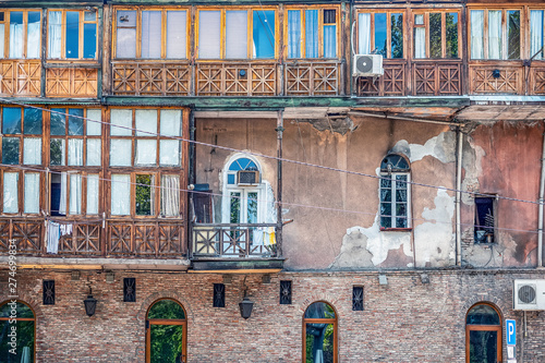 old Georgian court with lots of windows and balcony photo