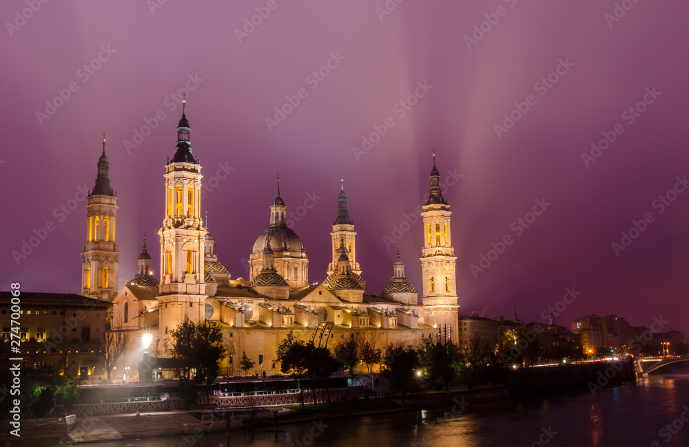 Night view of the Basilica of Our Lady of the Pillar, Zaragoza, Spain.