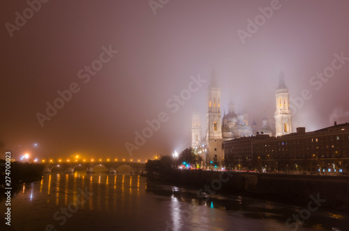 Night view of the Basilica of Our Lady of the Pillar, Zaragoza, Spain.