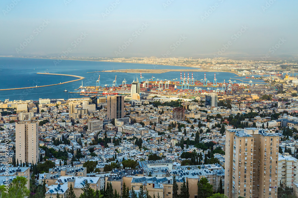 Panoramic view of the harbor port of Haifa, with downtown Haifa, the harbor, the industrial zone in a sunny summer day. Haifa, Northern Israel