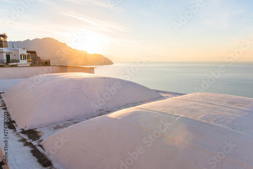 Beautiful sunrise over Amalfi town on Italian coast  Italy