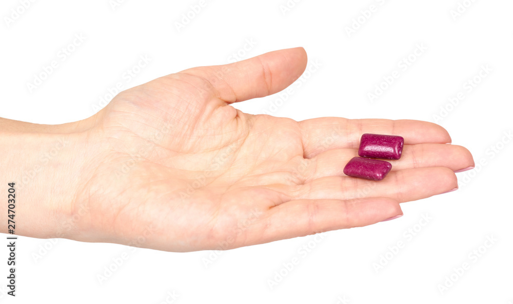 Hand with bright chewing gum, dental bubblegum. Hand with bright chewing gum, dental bubblegum.