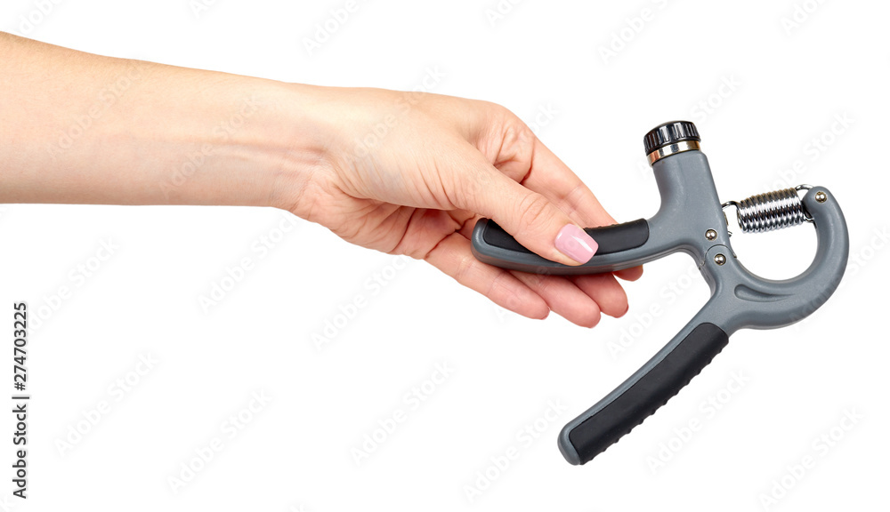 Hand with expander, sport equipment. Isolated background Hand with expander, sport equipment. Isolated background