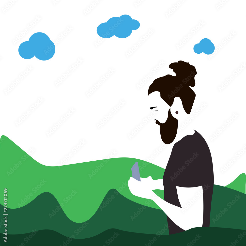 Hipster man with a beard, using a smartphone on the background of the Park.