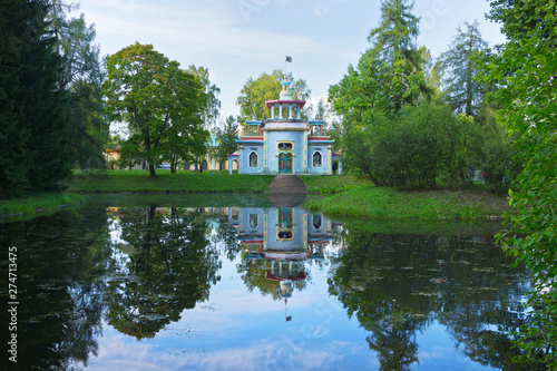 Chinese creaky gazebo or summer pavilon, built in 1778-1786 by the project of architect Y. Felte on the banks of the pond in the Catherine Park in Tsarskoye Selo on August day, Pushkin, St. Petersburg