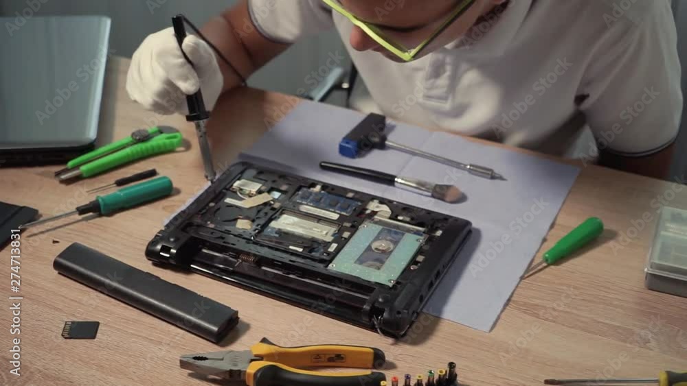 Computer repair and upgrade. Technician support upgrade part and fixing laptop. Computer repair and upgrade. Technician support upgrade part and fixing laptop.