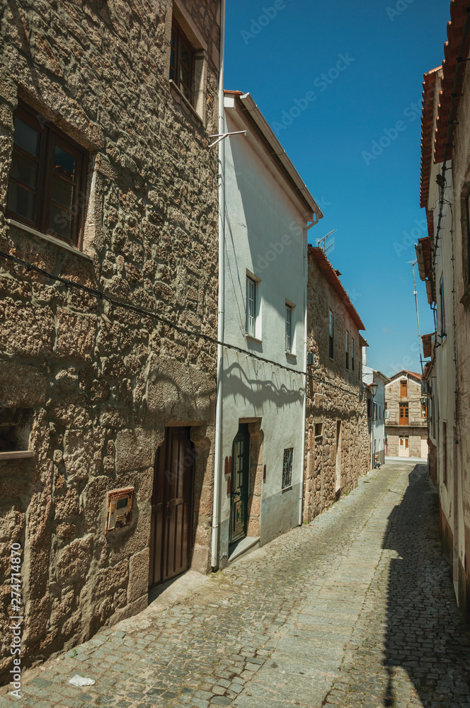 Old houses on a narrow deserted alley