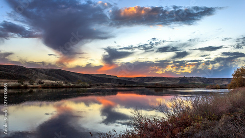 The sun sets on the Snake River at Three Island State Park, Glenn's Ferry, Idaho, USA photo