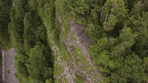 Aerial reveal of basalt columns mountain formation photo