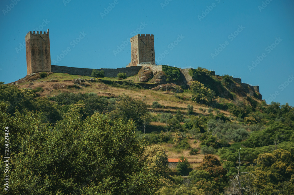 Hilly landscape with the towers of castle