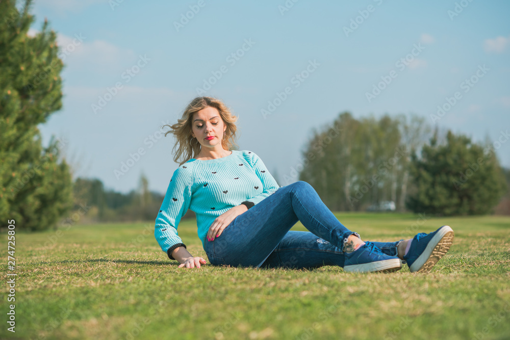 Pretty modern plus size lady lifestyle, woman’s beauty. Female model with large size of figure posing outdoor Pretty modern plus size lady lifestyle, woman’s beauty. Female model with large size of figure posing outdoor