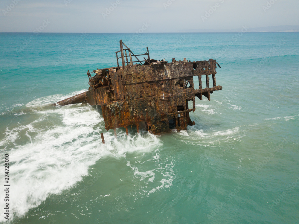 Old rusty ship wreck in the middle of the sea, next to Limmasol, Ciprus