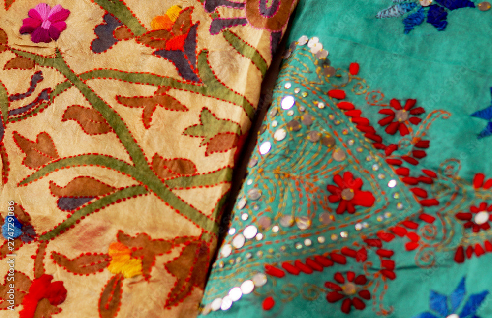 Indian woman dress sarees or saris hung in display in a retail shop Indian woman dress sarees or saris hung in display in a retail shop