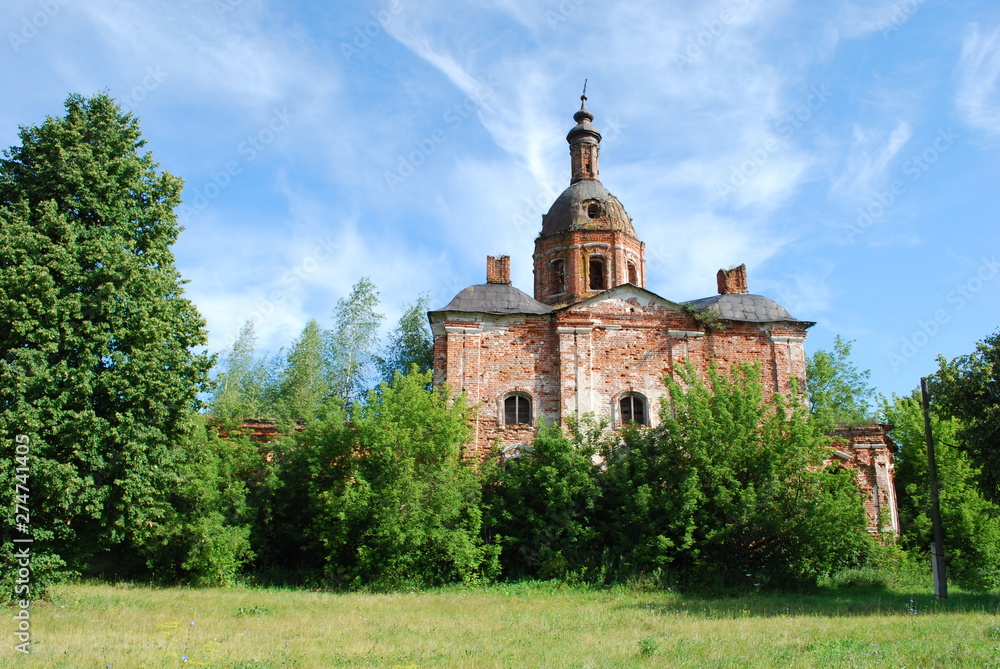 Old wooden Christian church in the field
