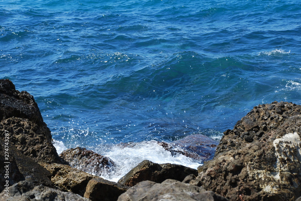 Beautiful blue sea and playful waves under the blue sky Beautiful blue sea and playful waves under the blue sky