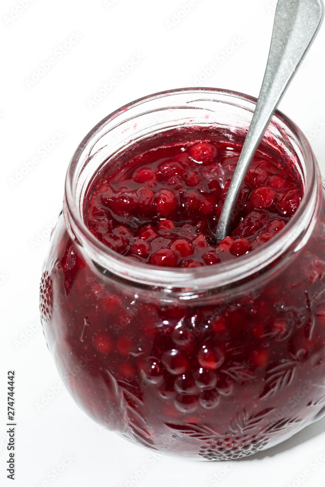 jar with sweet cowberry jam on white background, vertical top view jar with sweet cowberry jam on white background, vertical top view