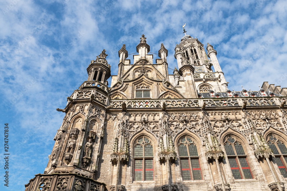 Side view of the famous Middelburg Town Hall against the sky, Netherlands Side view of the famous Middelburg Town Hall against the sky, Netherlands