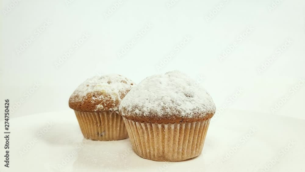 fragrant cake sprinkled with powdered sugar. slow motion fragrant cake sprinkled with powdered sugar. slow motion