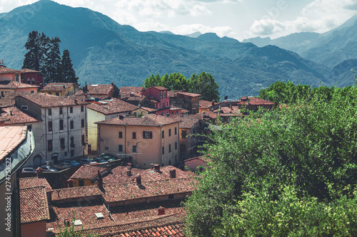 the Apuan Alps behind the town Barga, Tuscany, Italy photo