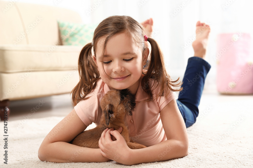 Portrait of cute girl with funny Brussels Griffon dog at home. Loyal friends Portrait of cute girl with funny Brussels Griffon dog at home. Loyal friends