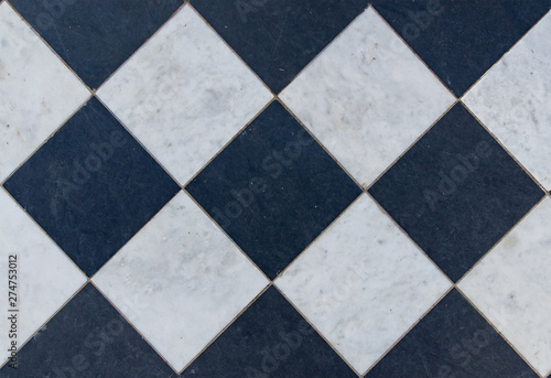 Black and white wintage checkered floor tiles.