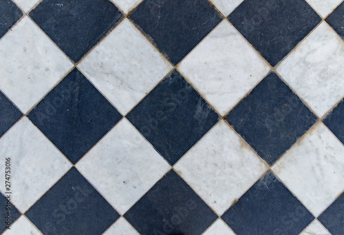 Black and white wintage checkered floor tiles.