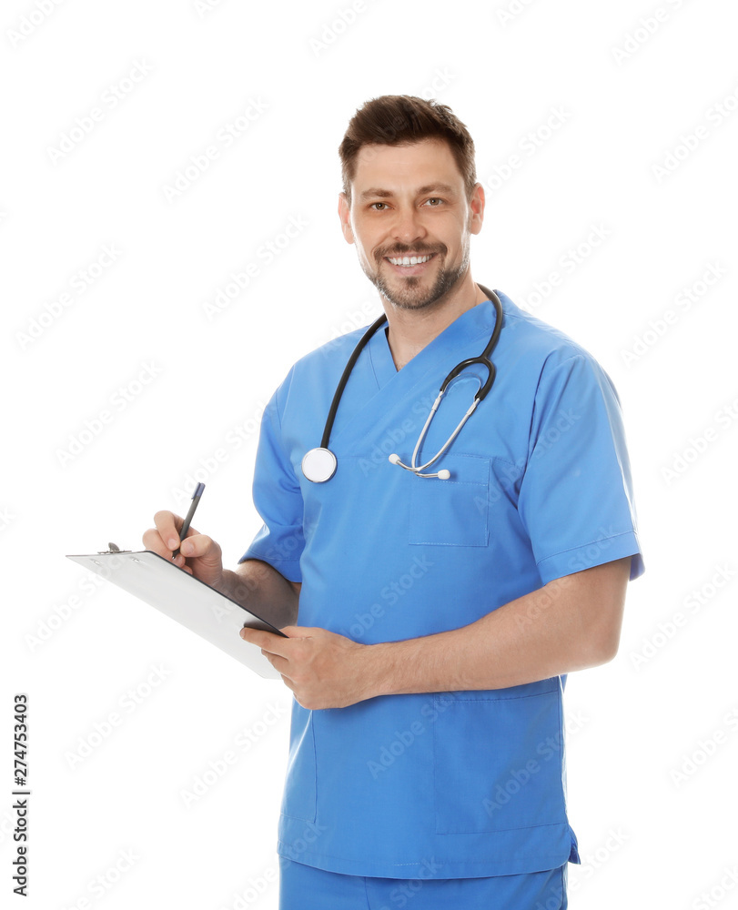 Portrait of smiling male doctor in scrubs with clipboard isolated on white. Medical staff Portrait of smiling male doctor in scrubs with clipboard isolated on white. Medical staff