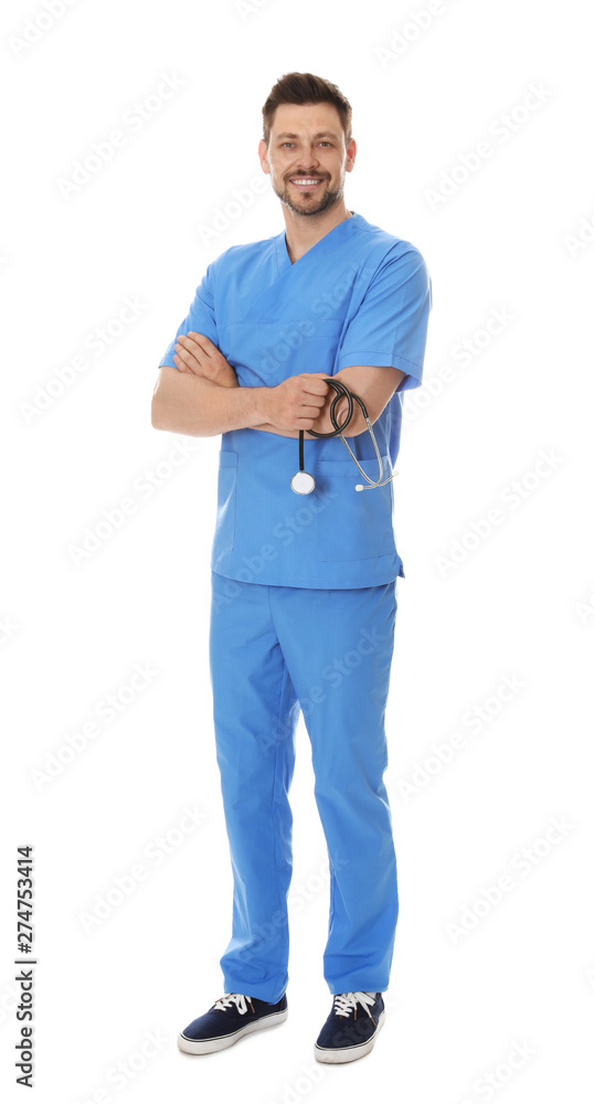 Full length portrait of smiling male doctor in scrubs isolated on white. Medical staff Full length portrait of smiling male doctor in scrubs isolated on white. Medical staff