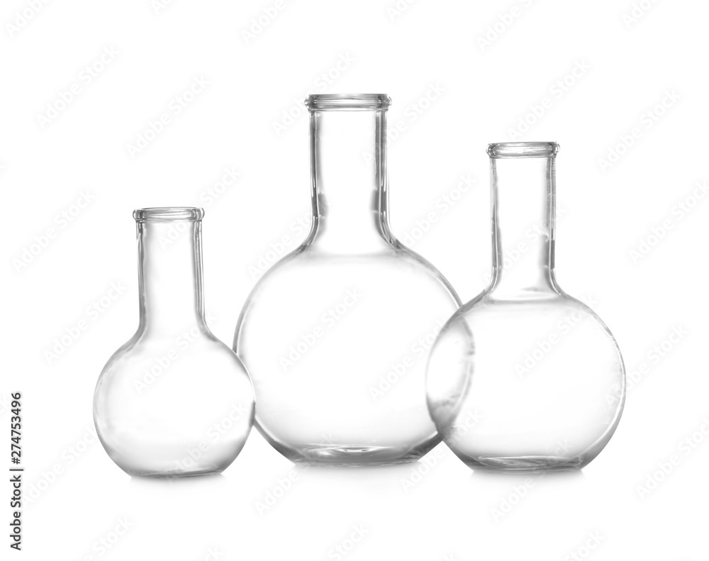 Empty Florence flasks on white background. Chemistry glassware Empty Florence flasks on white background. Chemistry glassware