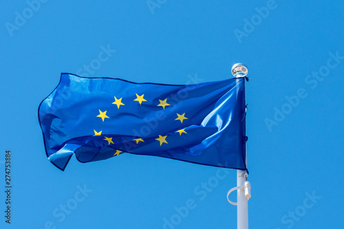 European union flag waving on a clear sky