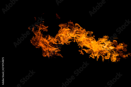 Dragon-shaped fire. Fire flames on black background. fire on black background isolated. fire patterns © Yevgeniy