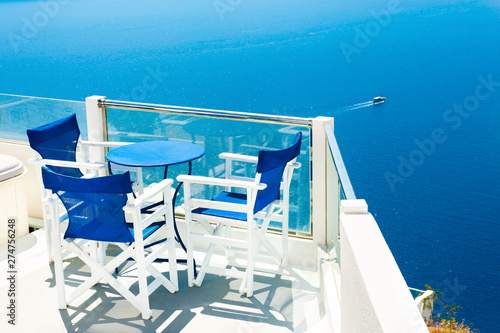 Beautiful terrace with sea view. Santorini island, Greece. Famous travel destination