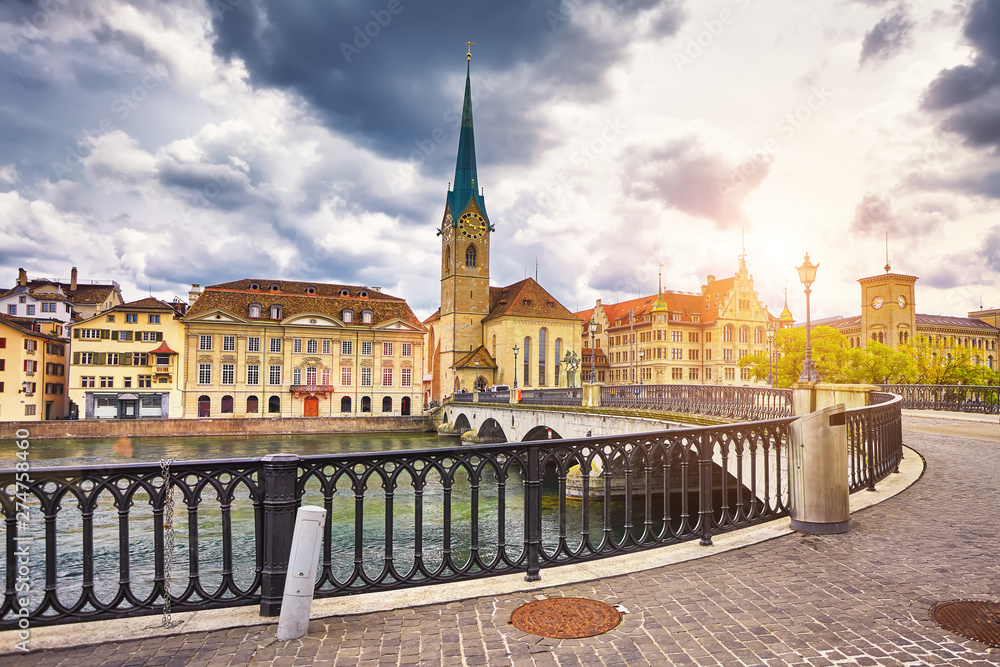 Fototapeta premium Zurich, Switzerland. View of the historic city center with famous Fraumunster Church, on the Limmat river