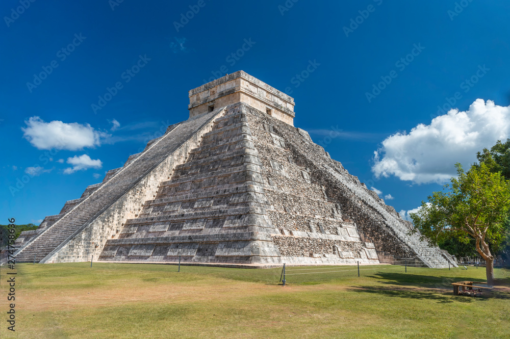 Chichen Itza showing the massive stone pyramid known as El Castillo which dominates the complex in the Yucatan peninsula Mexico.