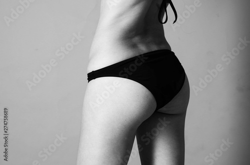 Beautiful young slender girl (woman) with long hair, wearing a w