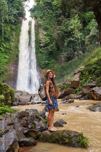  Woman near waterfal Git Git on Bali  Indonesia  