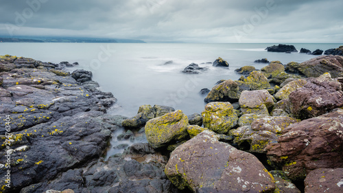 On Skernaghan Point’s rocky shoreline, Browns Bay, Islandmagee, County Antrim, Northern Ireland. © SJVL