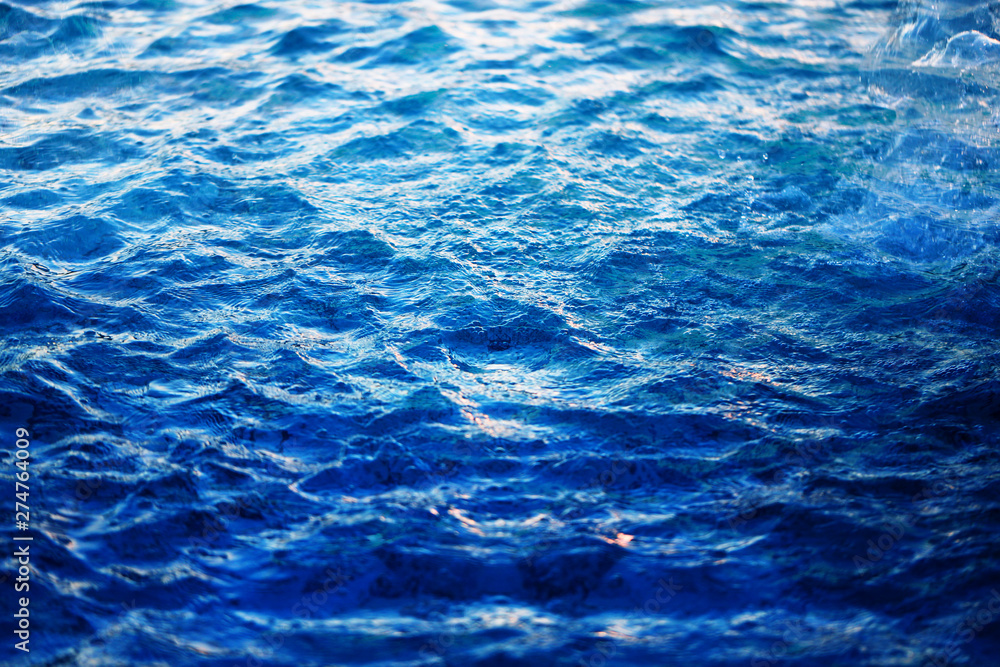 Obraz premium Macro photo background with transparent blue waves of sea
