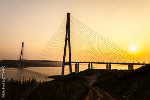 Cable-stayed bridge  Russky Bridge  to island Russkiy on the sunset. Vladivostok  Primorsky Krai  Russia